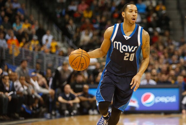 Jan 14, 2015; Denver, CO, USA; Dallas Mavericks guard Devin Harris (20) during the game against the Denver Nuggets at Pepsi Center. Mandatory Credit: Chris Humphreys-USA TODAY Sports