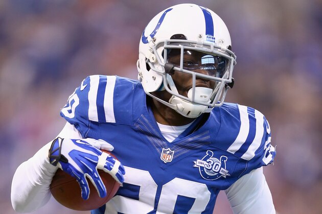 INDIANAPOLIS, IN - DECEMBER 15:  Darius Butler #20 of the Indianapolis Colts runs with the ball after intercepting a pass during the NFL game against the Houston Texans at Lucas Oil Stadium on December 15, 2013 in Indianapolis, Indiana.  (Photo by Andy Lyons/Getty Images)