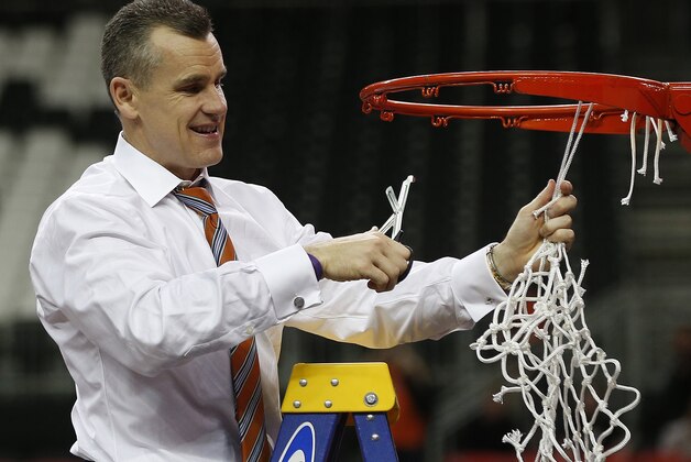 Florida head coach Billy Donovan takes the net after the second half of an NCAA college basketball game against Kentucky in the Championship round of the Southeastern Conference men's tournament, Sunday, March 16, 2014, in Atlanta. Florida won 61-60. (AP Photo/John Bazemore)