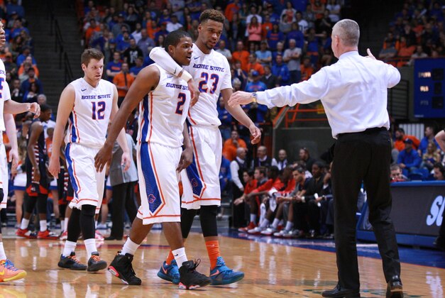 Mar 7, 2015; Boise, ID, USA; Boise State Broncos guard Derrick Marks (2) walks off the court with forward James Webb III (23) after fouling out of his final game at Boise State during the second half against  Fresno State Bulldogs at Taco Bell Arena.  Mandatory Credit: Brian Losness-USA TODAY Sports