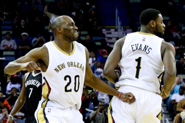 Feb 25, 2015; New Orleans, LA, USA; New Orleans Pelicans guard Quincy Pondexter (20) celebrate after a score by guard Tyreke Evans (1) during the fourth quarter of a game against the Brooklyn Nets at the Smoothie King Center. The Pelicans defeated the Nets 102-96. Mandatory Credit: Derick E. Hingle-USA TODAY Sports