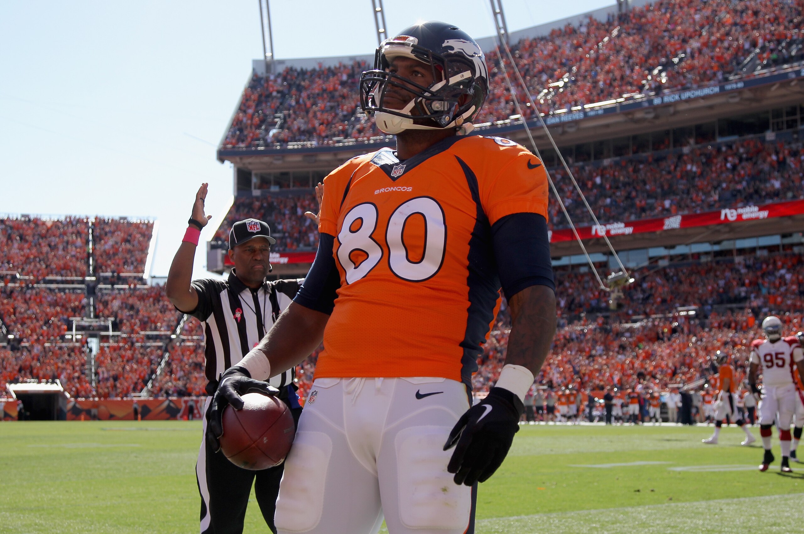 DENVER, CO - OCTOBER 05: Tight end Julius Thomas #80 of the Denver Broncos celebrates after scoring on quarterback Peyton Manning #18 of the Denver Broncos 500th career touchdown pass to take a 7-3 lead over the Arizona Cardinals at Sports Authority Field at Mile High on October 5, 2014 in Denver, Colorado. The Broncos defeated the Cardinals 41-20. (Photo by Doug Pensinger/Getty Images) DENVER, CO - OCTOBER 05: Tight end Julius Thomas #80 of the Denver Broncos celebrates after scoring on quarterback Peyton Manning #18 of the Denver Broncos 500th career touchdown pass to take a 7-3 lead over the Arizona Cardinals at Sports Authority Field at Mile High on October 5, 2014 in Denver, Colorado. The Broncos defeated the Cardinals 41-20. (Photo by Doug Pensinger/Getty Images)