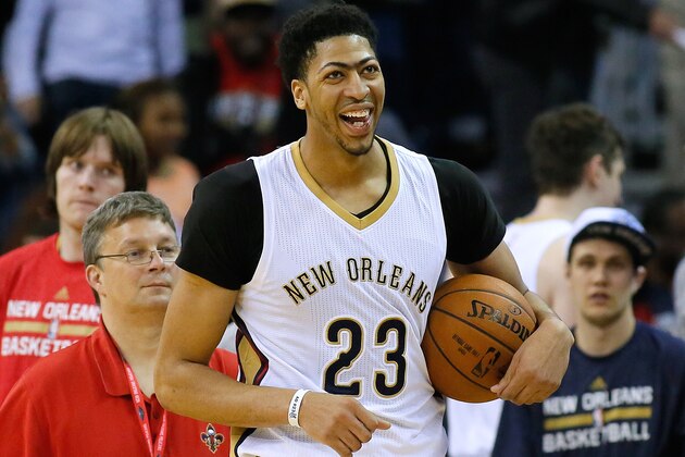 New Orleans Pelicans forward Anthony Davis (23) celebrates after a 95-89 win over the Memphis Grizzlies in an NBA basketball game, Saturday, March. 7, 2015, in New Orleans. (AP Photo/Jonathan Bachman)