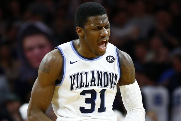 PHILADELPHIA, PA - MARCH 7: Dylan Ennis #31 of the Villanova Wildcats reacts after scoring a three-point basket against the St. John's Red Storm during the second half of an NCAA college basketball game on March 7, 2015 at the Wells Fargo Center in Philadelphia, Pennsylvania. Villanova Wildcats defeated St. John's Red Storm 105-68. (Photo by Rich Schultz /Getty Images)
