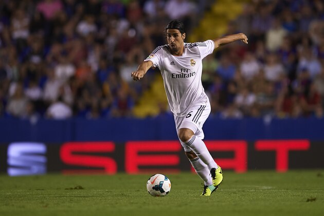 VALENCIA, SPAIN - OCTOBER 05:  Sami Khedira of Real Madrid runs with the ball during the La Liga match between Levante UD and Real Madrid at Ciutat de Valencia on October 5, 2013 in Valencia, Spain.  (Photo by Manuel Queimadelos Alonso/Getty Images)