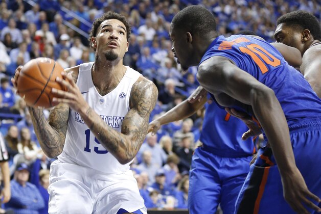 Mar 7, 2015; Lexington, KY, USA; Kentucky Wildcats forward Willie Cauley-Stein (15) shoots the ball against Florida Gators forward Dorian Finney-Smith (10) in the second half at Rupp Arena. Kentucky Wildcats defeated the Florida Gators 67-50. Mandatory Credit: Mark Zerof-USA TODAY Sports