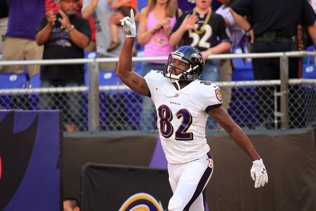 BALTIMORE, MD - AUGUST 07: Wide receiver Torrey Smith #82 of the Baltimore Ravens is introduced before the start of an NFL pre-season game against the San Francisco 49ers at M&T Bank Stadium on August 7, 2014 in Baltimore, Maryland.  (Photo by Rob Carr/Getty Images)