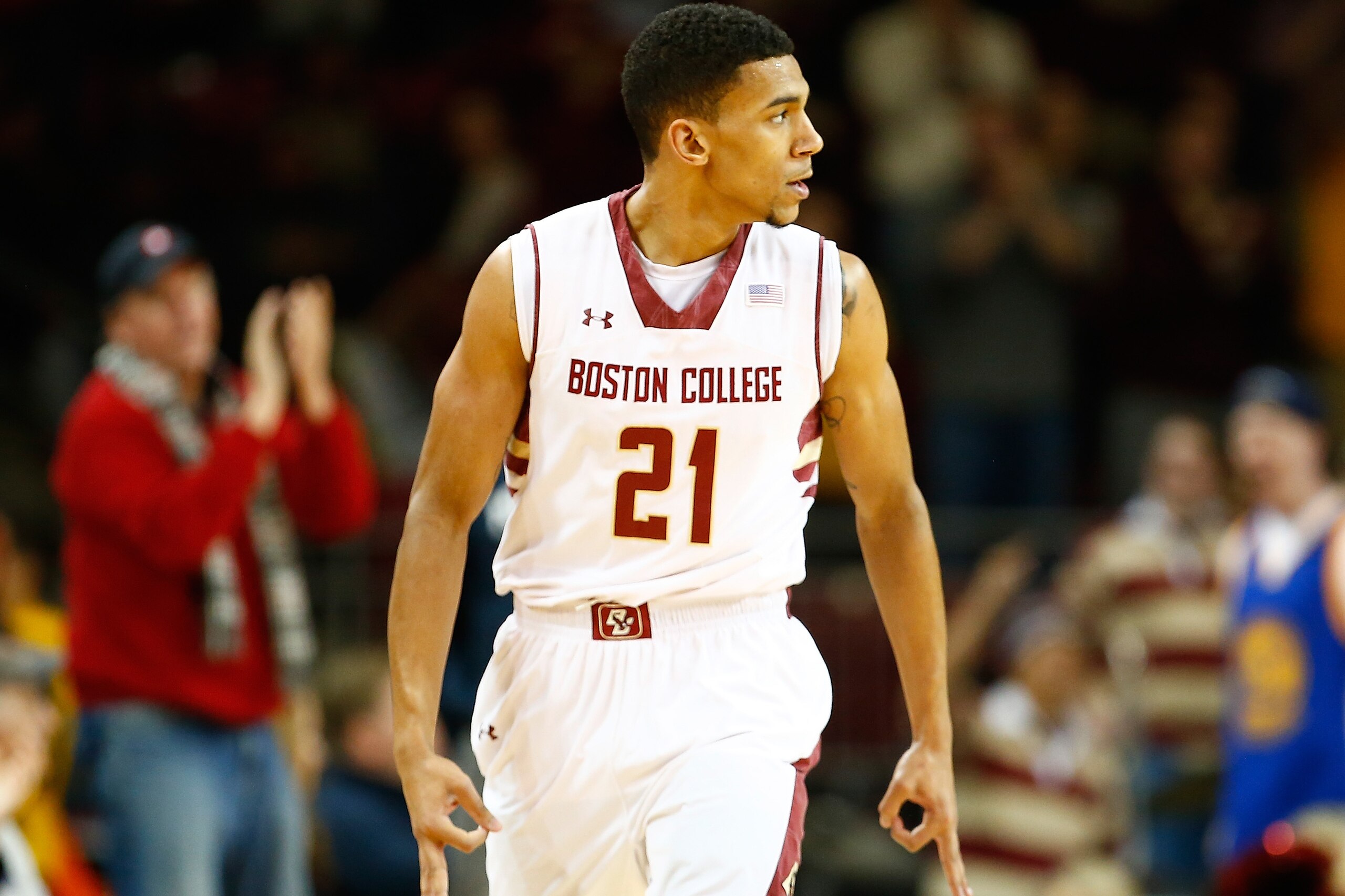 CHESTNUT HILL, MA - JANUARY 17: Olivier Hanlan #21 of the Boston College Eagles celebrates his three-point shot in the first half against the Virginia Cavaliers during the game at Conte Forum on January 17, 2015 in Chestnut Hill, Massachusetts.  (Photo by Jared Wickerham/Getty Images)