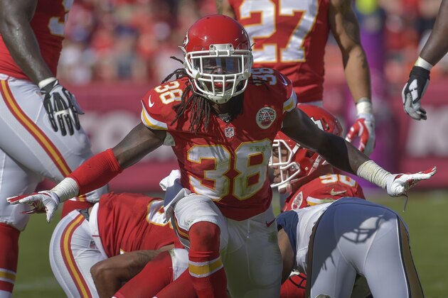 Kansas City Chiefs strong safety Ron Parker (38) celebrates a stop against the St. Louis Rams during an NFL football game Sunday, Oct. 26, 2014, in Kansas City, Mo. (AP Photo/Reed Hoffmann)