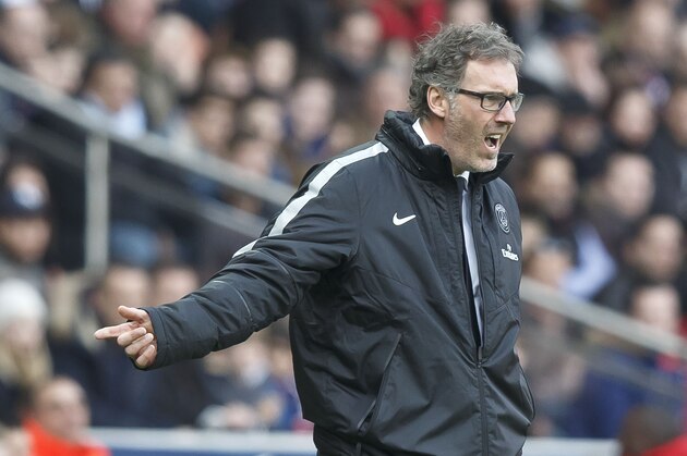 PSG's head coach Laurent Blanc, gestures during a League One soccer match Paris Saint Germain against Lens at Parc des Prince stadium in Paris, France, Saturday, March 7, 2015. Paris Saint Germain won 4-1. (AP Photo/Michel Euler)