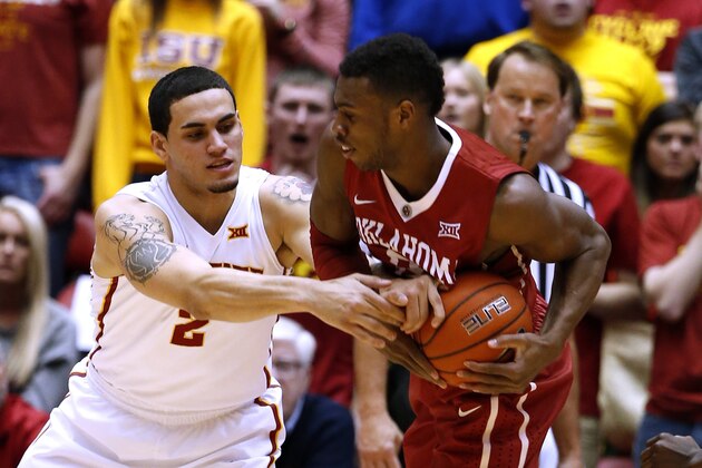 AMES, IA - MARCH 2: Abdel Nader #2 of the Iowa State Cyclones battles for the ball with Buddy Hield #24 of the Oklahoma Sooners in the first half of play at Hilton Coliseum on March 2, 2015 in Ames, Iowa. (Photo by David Purdy/Getty Images)