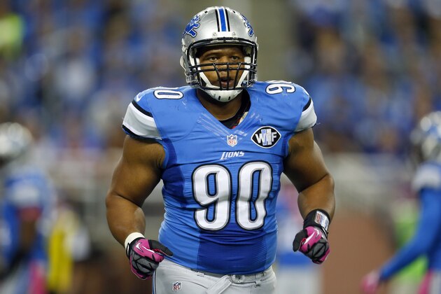 Detroit Lions defensive tackle Ndamukong Suh (90) runs off the field during an NFL game against the Buffalo Bills at Ford Field in Detroit on Sunday, Oct. 5, 2014. (Jeff Haynes/AP Images for Panini)