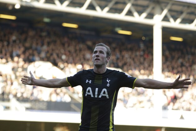 Tottenham’s Harry Kane celebrates after scoring his second goal of the game during the English Premier League soccer match between Queens Park Rangers and Tottenham Hotspur at the Loftus Road stadium London, Saturday, March, 7, 2015. (AP Photo/Alastair Grant)
