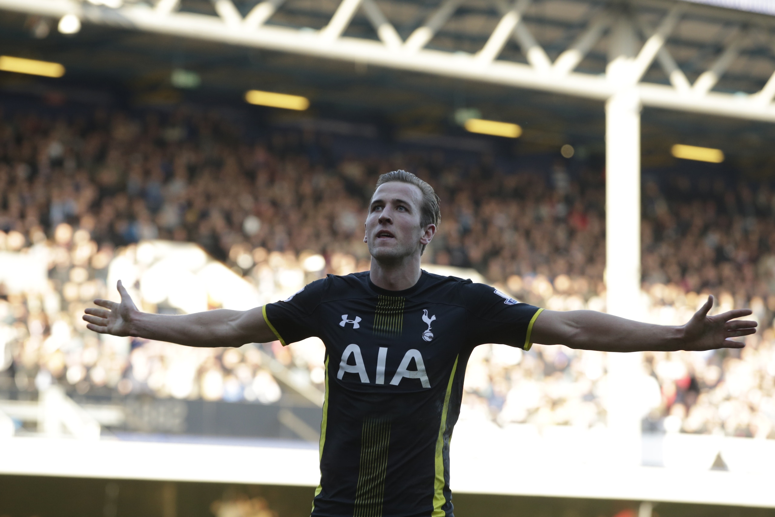Tottenham’s Harry Kane celebrates after scoring his second goal of the game during the English Premier League soccer match between Queens Park Rangers and Tottenham Hotspur at the Loftus Road stadium London, Saturday, March, 7, 2015. (AP Photo/Alastair Grant)
