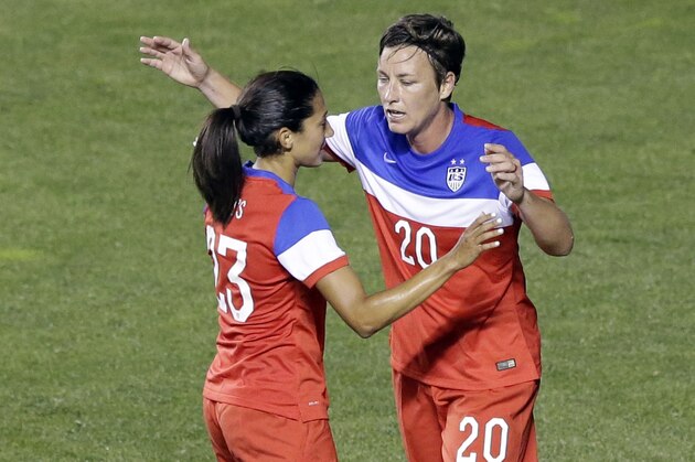 United States' Abby Wambach (20) celebrates with Christen Press (23) after scoring in the first half of an international friendly game with Mexico on Saturday, Sept. 13, 2014, in Sandy, Utah. (AP Photo/Rick Bowmer)