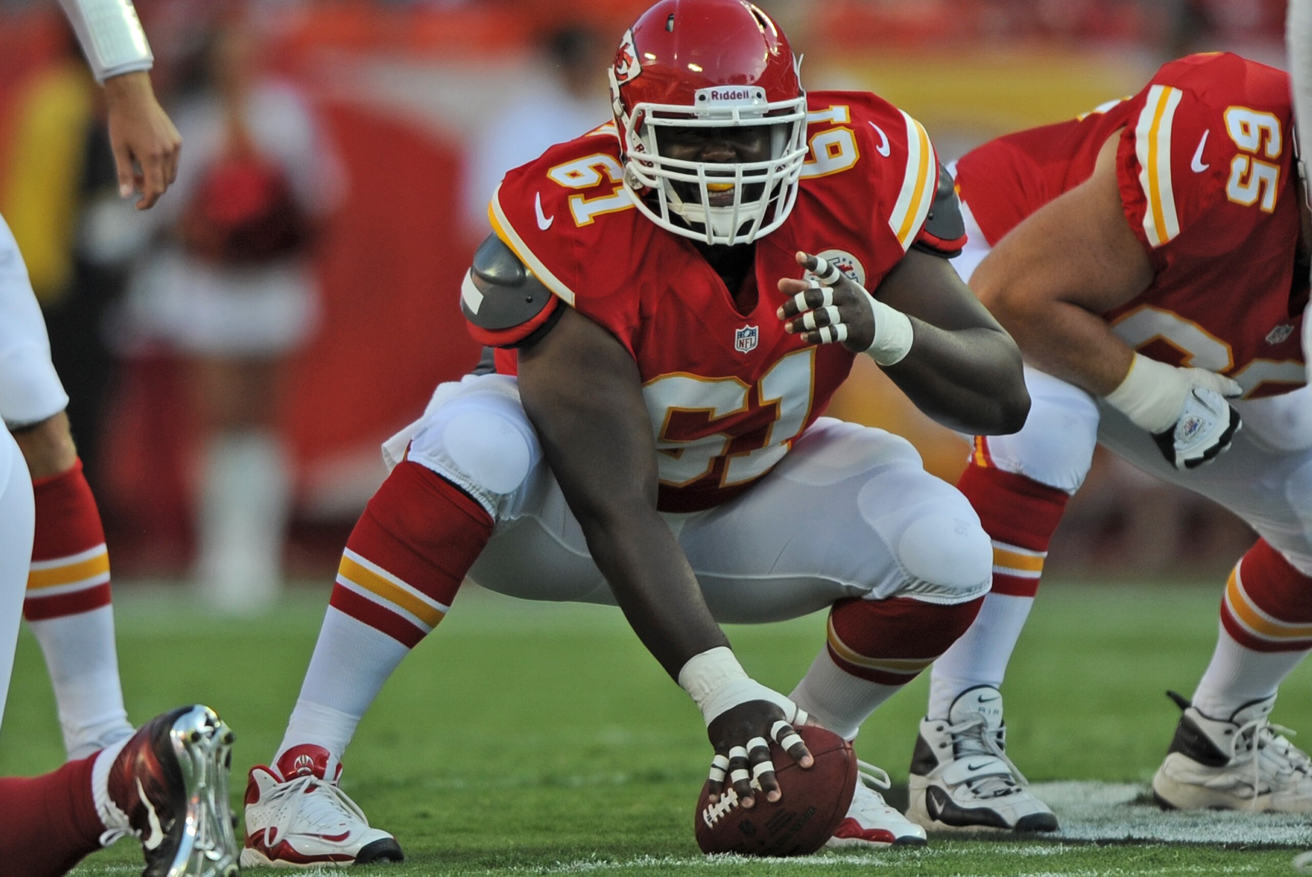 KANSAS CITY, MO - AUGUST 10:  Center Rodney Hudson #61 of the Kansas City Chiefs gets set at the line against the Arizona Cardinals during the first half on August 10, 2012 at Arrowhead Stadium in Kansas City, Missouri.  (Photo by Peter Aiken/Getty Images)