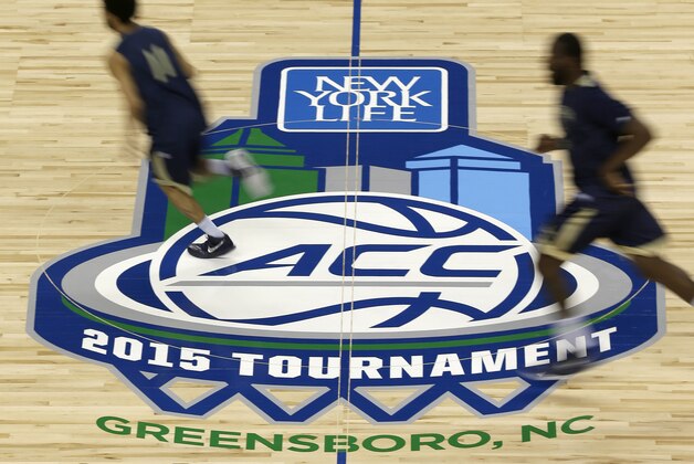 Georgia Tech players run a drill during an NCAA college basketball practice in the Atlantic Coast Conference tournament in Greensboro, N.C., Monday, March 9, 2015. The tournament begins on Tuesday. (AP Photo/Chuck Burton)