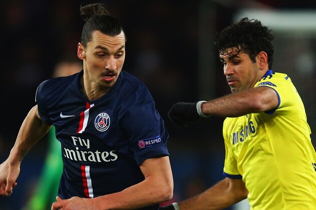 PARIS, FRANCE - FEBRUARY 17:  Zlatan Ibrahimovic of Paris Saint-Germain evades Diego Costa of Chelsea during the UEFA Champions League Round of 16 match between Paris Saint-Germain and Chelsea at Parc des Princes on February 17, 2015 in Paris, France.  (Photo by Clive Rose/Getty Images)