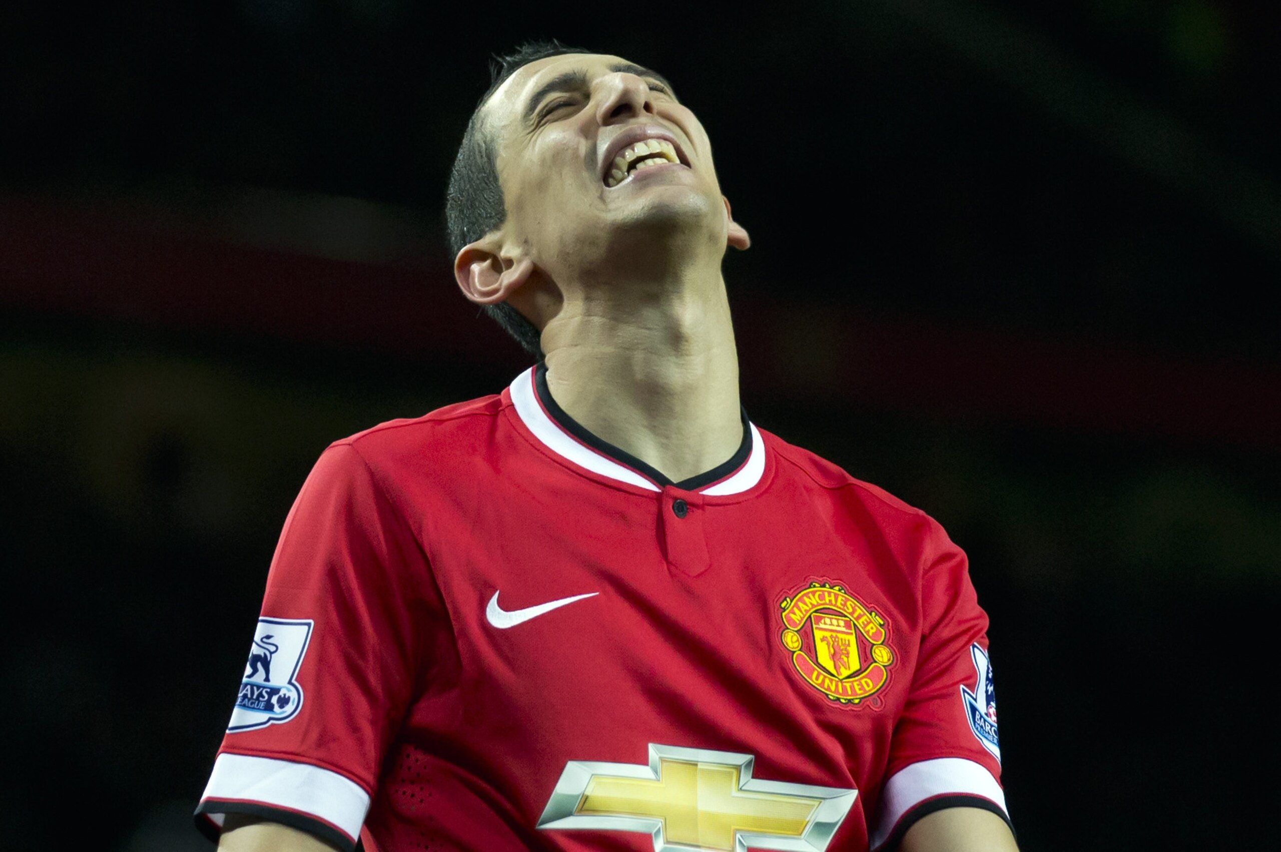 Manchester United's Angel Di Maria reacts after a missed opportunity during his team's English Premier League soccer match between Manchester United and Southampton at Old Trafford Stadium, Manchester, England, Sunday Jan. 11, 2015. (AP Photo/Jon Super)