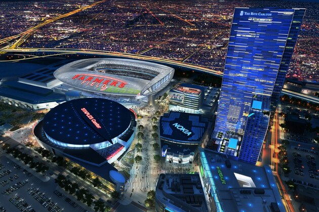 FILE - In this file image show provided by AEG, a proposed NFL football stadium, to be named Farmers Field, is depicted next to Staples Center in Los Angeles in this artist's rendering. With about a month to go before their self-imposed deadline to reach a deal with the city, executives with the company seeking to build an NFL stadium for downtown Los Angeles take their plan before a council committee on Thursday, June 30, 2011.(AP Photo/AEG, File)
