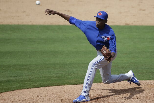 Toronto Blue Jays pitcher Miguel Castro throws in the fifth inning during a spring training baseball exhibition game against the Philadelphia Phillies, Saturday, March 7, 2015, in Clearwater, Fla. (AP Photo/Lynne Sladky)
