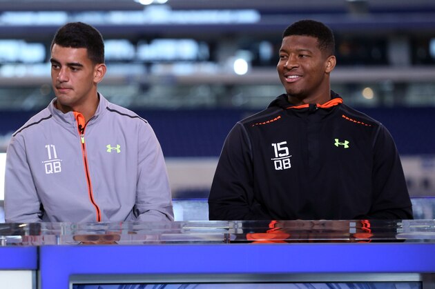 Feb 21, 2015; Indianapolis, IN, USA; Florida State quarterback Jameis Winston (right) and Oregon Ducks quarterback Marcus Mariota do an interview on the NFL Network after finishing their workout during the 2015 NFL Combine at Lucas Oil Stadium. Mandatory Credit: Brian Spurlock-USA TODAY Sports