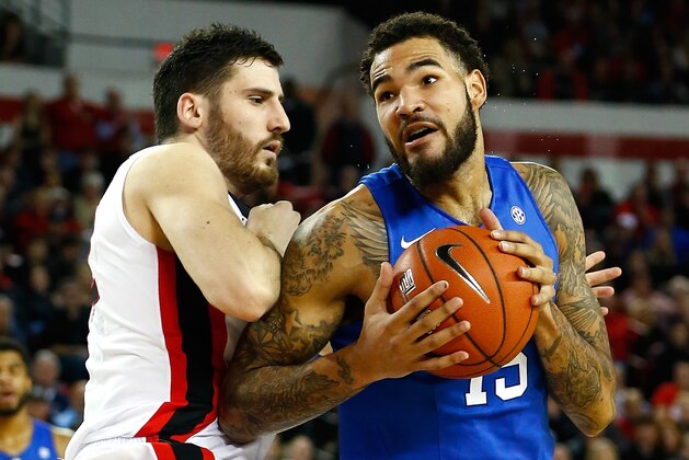 ATHENS, GA - MARCH 03:  Willie Cauley-Stein #15 of the Kentucky Wildcats drives against Nemanja Djurisic #42 of the Georgia Bulldogs at Stegeman Coliseum on March 3, 2015 in Athens, Georgia.  (Photo by Kevin C. Cox/Getty Images)