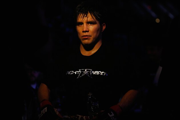 PHOENIX, AZ - DECEMBER 13:  Henry Cejudo leaves the octagon after defeating Dustin Kimura (not pictured) during the UFC Fight Night event at the at U.S. Airways Center on December 13, 2014 in Phoenix, Arizona.  (Photo by Christian Petersen/Getty Images)