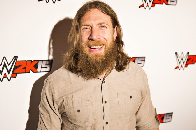 IMAGE DISTRIBUTED FOR 2K - WWE Superstar Daniel Bryan is all smiles at the WWE 2K15 Press Event at Cicada Restaurant, on Saturday, August 16, 2014 in Los Angeles. (Photo by Colin Young-Wolff/Invision for 2K/AP Images)
