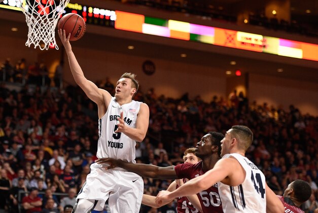 March 7, 2015; Las Vegas, NV, USA; Brigham Young Cougars guard Kyle Collinsworth (5) shoots a layup against the Santa Clara Broncos during the first half in the quarterfinals of the West Coast Conference tournament at Orleans Arena. Mandatory Credit: Kyle Terada-USA TODAY Sports