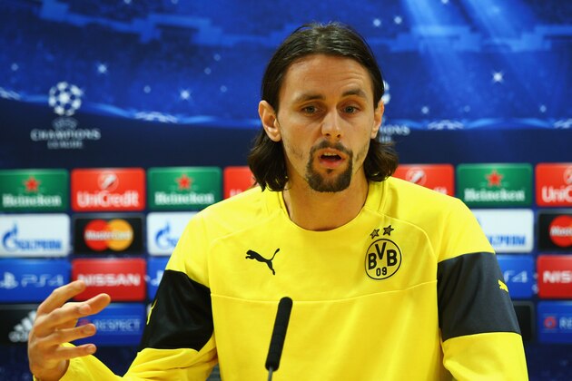 LONDON, ENGLAND - NOVEMBER 25:  Defender Neven Subotic speaks during a Borussia Dortmund press conference, ahead of the UEFA Champions League Group D match against Arsenal, at Emirates Stadium on November 25, 2014 in London, England.  (Photo by Ian Walton/Getty Images)