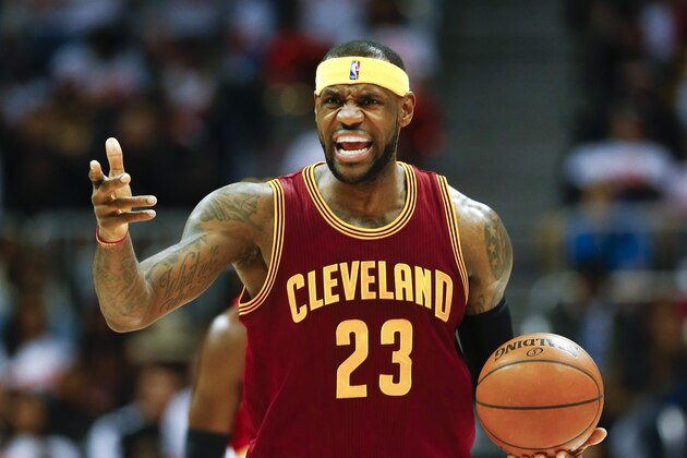 Cleveland Cavaliers forward LeBron James reacts after a foul in the first half of an NBA basketball game against the Atlanta Hawks on Friday, March 6, 2015, in Atlanta. Atlanta won 106-97. (AP Photo/John Bazemore)