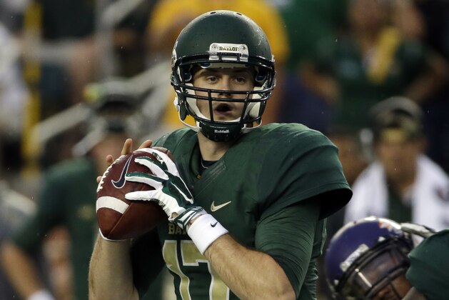 Baylor back up quarterback Seth Russell prepares to pass in the first half of an NCAA college football game against Northwestern State, Saturday, Sept. 6, 2014, in Waco, Texas. Russell threw for 438 yards and five touchdowns while playing only the first half of the 70-6 Baylor win. (AP Photo/Tony Gutierrez)
