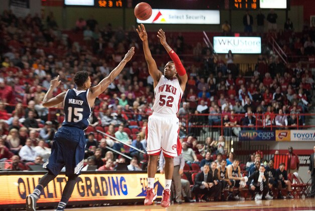 Feb 7, 2015; Bowling Green, KY, USA; Western Kentucky Hilltoppers guard T.J. Price (52) shoots the ball over Rice Owls guard Bishop Mency (15) during the second half at E.A. Diddle Arena. Mandatory Credit: Joshua Lindsey-USA TODAY Sports