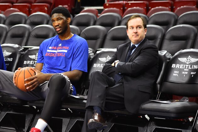 PHILADELPHIA, PA - DECEMBER 15:  Joel Embiid #21 of the Philadelphia 76er and Sam Hinkie, General Manager of the Philadelphia 76ers before the game against the Boston Celtics on December 15, 2014 at Wells Fargo Center in Philadelphia, PA. NOTE TO USER: User expressly acknowledges and agrees that, by downloading and or using this photograph, User is consenting to the terms and conditions of the Getty Images License Agreement. Mandatory Copyright Notice: Copyright 2014 NBAE (Photo by Jesse D. Garrabrant/NBAE via Getty Images)