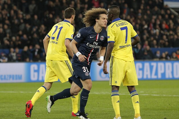 PSG's David Luiz reacts after missing a chance during the Champions League round of 16 first leg soccer match between Paris Saint Germain and Chelsea at the Parc des Princes stadium in Paris, France, Tuesday, Feb. 17, 2015. (AP Photo/Christophe Ena)