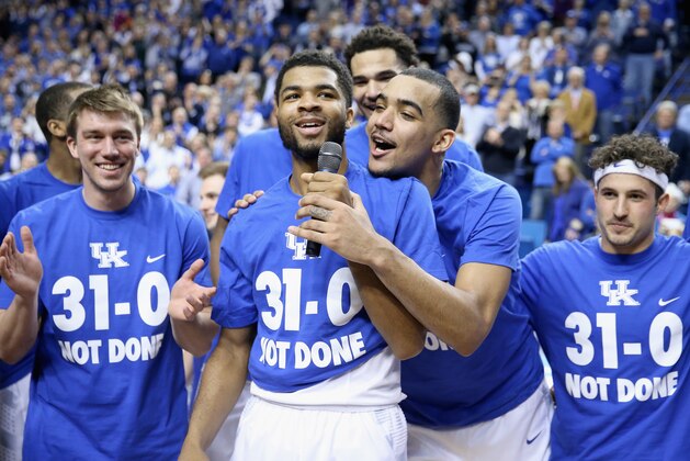 LEXINGTON, KY - MARCH 07:  Andrew Harrison #5 (left) and Trey Lyles #41 (right) of the Kentucky Wildcats talk to the crowd following the game against the Florida Gators at Rupp Arena on March 7, 2015 in Lexington, Kentucky. Kentucky won 67-50 to finish the regular 31-0.  (Photo by Andy Lyons/Getty Images)