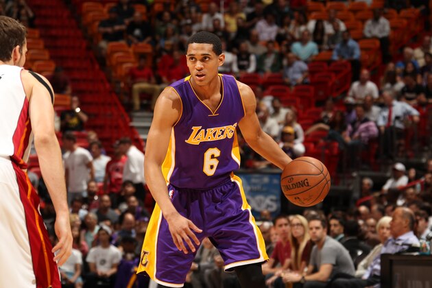 MIAMI, FL - MARCH 4:  Jordan Clarkson #6 of the Los Angeles Lakers handles the ball against the Miami Heat on March 4, 2015 at American Airlines Arena in Miami, Florida.  NOTE TO USER: User expressly acknowledges and agrees that, by downloading and or using this Photograph, user is consenting to the terms and conditions of the Getty Images License Agreement. Mandatory Copyright Notice: Copyright 2015 NBAE (Photo by Issac Baldizon/NBAE via Getty Images)
