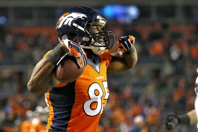 Denver Broncos tight end Virgil Green (85) celebrates his touchdown against the Oakland Raiders during the second half of an NFL football game, Sunday, Dec. 28, 2014, in Denver. (AP Photo/Jack Dempsey)