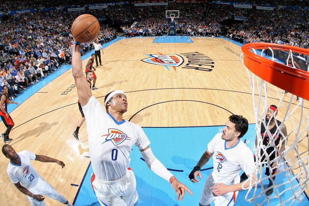 OKLAHOMA CITY, OK - MARCH 8:  Russell Westbrook #0 of the Oklahoma City Thunder grabs a rebound against the Toronto Raptors on March 8, 2015 at the Chesapeake Energy Arena in Oklahoma City, Oklahoma. NOTE TO USER: User expressly acknowledges and agrees that, by downloading and or using this Photograph, user is consenting to the terms and conditions of the Getty Images License Agreement. Mandatory Copyright Notice: Copyright 2015 NBAE (Photo by Layne Murdoch Jr./NBAE via Getty Images)