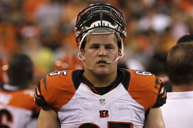 Cincinnati Bengals guard Clint Boling walks on the sidelines during an NFL preseason football game against the New York Jets, Saturday, Aug. 16, 2014, in Cincinnati. (AP Photo/Tony Tribble)