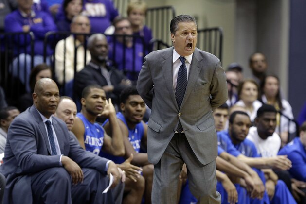 Kentucky head coach John Calipari calls out in the second half of an NCAA college basketball game against LSU in Baton Rouge, La., Tuesday, Feb. 10, 2015.  Kentucky won 71-69. (AP Photo/Gerald Herbert)