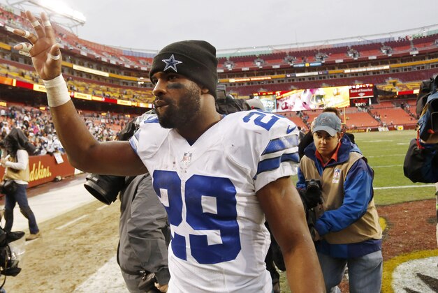 Dec 28, 2014; Landover, MD, USA; Dallas Cowboys running back DeMarco Murray (29) waves to fans while leaving the field after the Cowboys' game agains the Washington Redskins at FedEx Field. The Cowboys won 44-17. Mandatory Credit: Geoff Burke-USA TODAY Sports