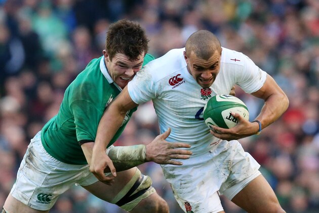 DUBLIN, IRELAND - MARCH 01:  Jonathan Joseph of England is tackled by Peter O'Mahoney of Ireland during the RBS Six Nations match between Ireland and England at the Aviva Stadium on March 1, 2015 in Dublin, Ireland.  (Photo by Alex Livesey/Getty Images)