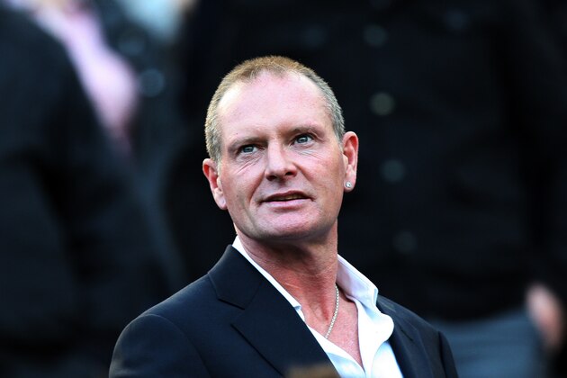 FILE - In this Oct. 16, 2011 file photo, Paul Gascoigne, is seen at the English Premier League soccer match between Newcastle United and Tottenham Hotspurs at St James' Park, Newcastle, England. According to news reports published Sunday March 10, 2013, Gascoigne says he's back from brink of death after receiving treatment for alcoholism in USA. The 45-year-old Gascoigne flew back home on Saturday, a month after being admitted to the intensive care unit of a hospital in Phoenix, USA, following a relapse in his long-running struggle with alcoholism. (AP Photo/Scott Heppell, File)