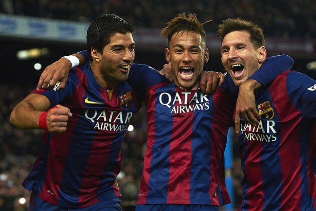 FC Barcelona's Lionel Messi, from Argentine, right, Neymar, from Brazil, center, and Luis Suarez, from Uruguay, celebrate after scoring against Atletico Madrid during a Spanish La Liga soccer match at the Camp Nou stadium in Barcelona, Spain, Sunday, Jan. 11, 2015. (AP Photo/Siu Wu)