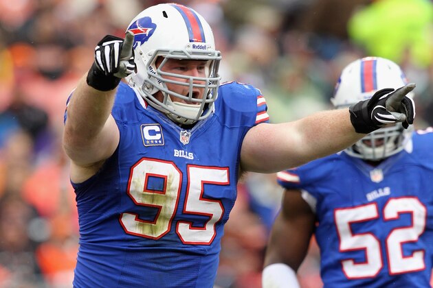 CLEVELAND, OH - SEPTEMBER 23:  Defenders Kyle Williams #95 and Arthur Moats #52 of the Buffalo Bills celebrates after a sack against the Cleveland Browns at Cleveland Browns Stadium on September 23, 2012 in Cleveland, Ohio.  (Photo by Matt Sullivan/Getty Images)