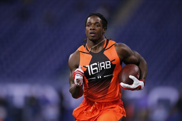 Wisconsin running back Melvin Gordon runs a drill at the NFL football scouting combine in Indianapolis, Saturday, Feb. 21, 2015. (AP Photo/Julio Cortez)