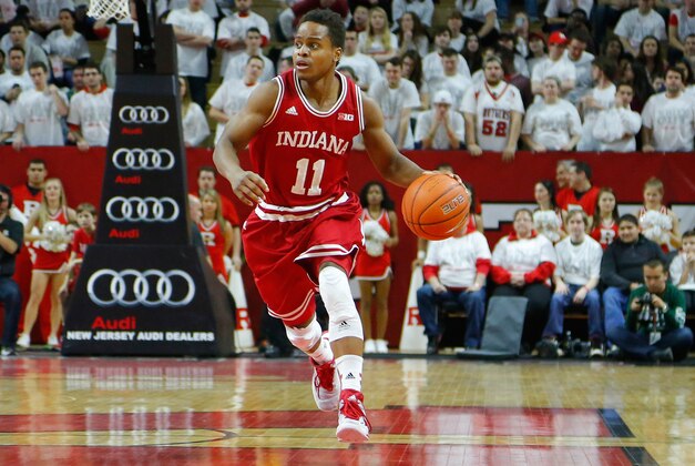 Feb 22, 2015; Piscataway, NJ, USA;  Indiana Hoosiers guard Yogi Ferrell (11) brings the ball up court during the first half against the Rutgers Scarlet Knights at the Louis Brown Athletic Center. Mandatory Credit: Jim O'Connor-USA TODAY Sports