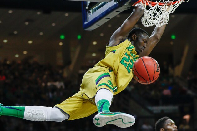 SOUTH BEND, IN - MARCH 07: Jerian Grant #22 of the Notre Dame Fighting Irish dunks the ball against the Clemson Tigers at Purcell Pavilion on March 7, 2015 in South Bend, Indiana. Notre Dame defeated Clemson 81-67. (Photo by Michael Hickey/Getty Images)